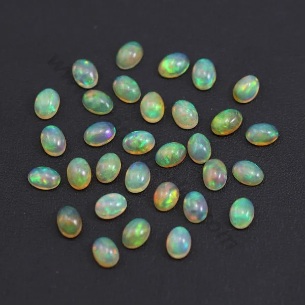 Cabochão de opala etíope, multicolorido, oval, 5x7mm x 1pc