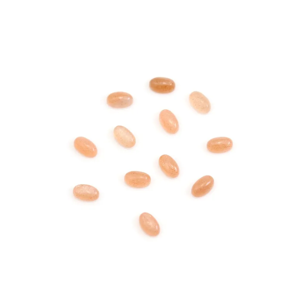 Cabochon aus orangenem Mondstein, oval geformt, 3x5mm x 2Stk