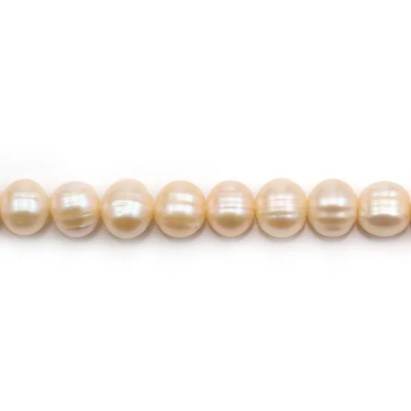 Freshwater cultured pearls, salmon color, oval/irregular shape, 10-11mm x 37cm