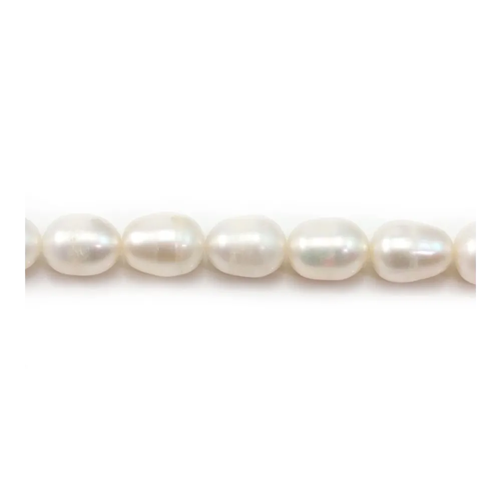 White oval freshwater pearls on thread 10-11mm x 39cm