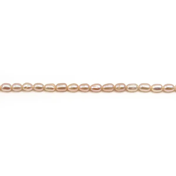 Salmon color oval freshwater pearls on thread 3-4mm x 40cm