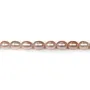 Perles d'eau douce ovales rosé 6-7mm x 40cm