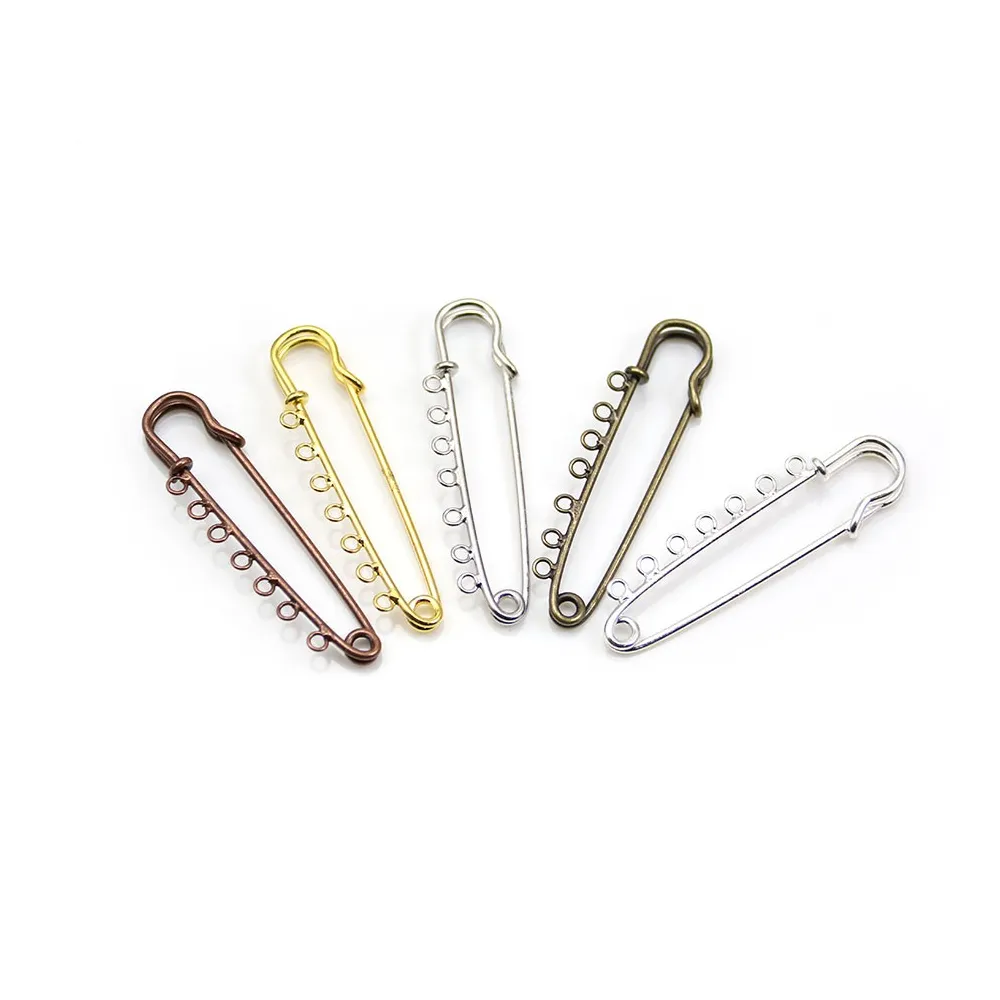 Brooch in metal, in diferent colors, with 7 rings, 58mm * 13 - 15mm x 1pc