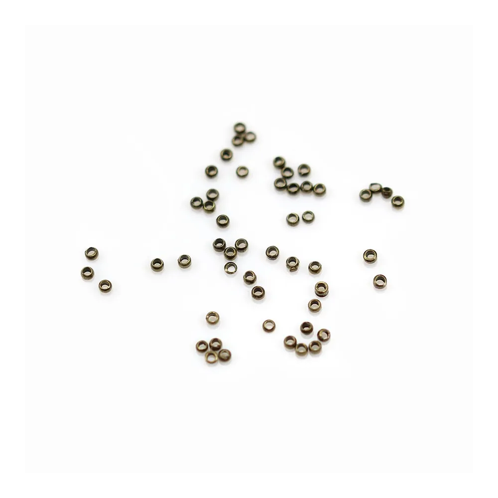 Perles à écraser, en métal de différentes couleur 1.5 * 0.8mm x 5grs