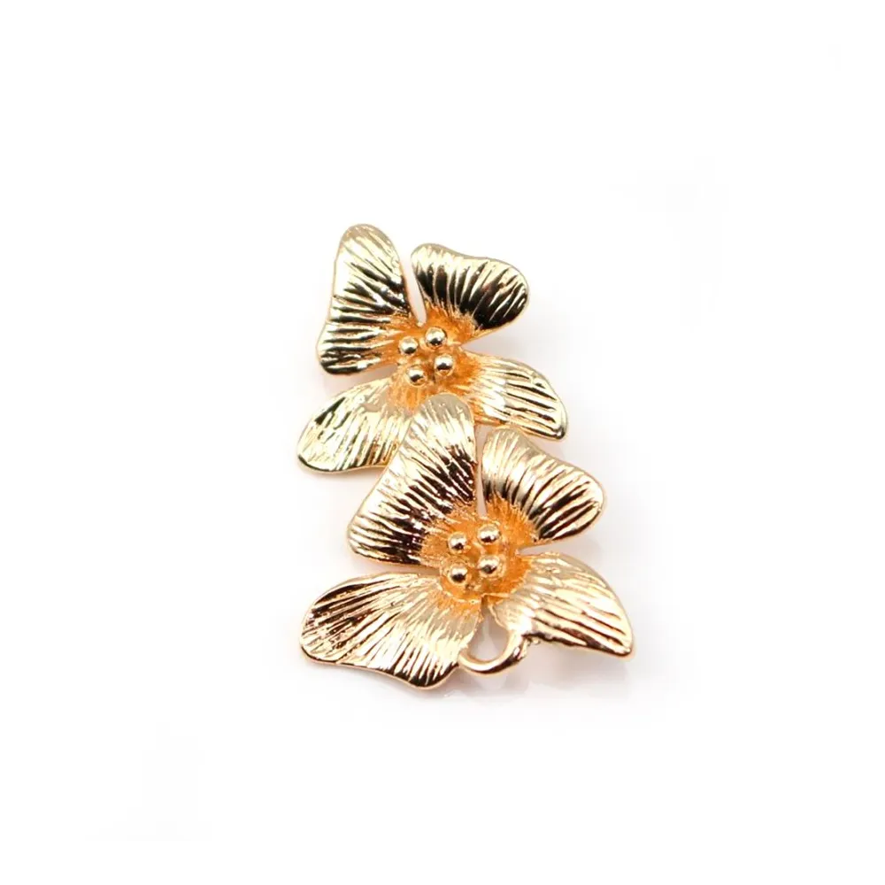 Deux Fleur des îles dorée sur laiton 15x22mm x 1pc