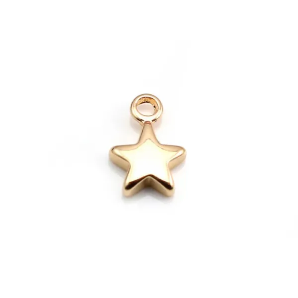 Breloque étoile par "flash" or sur laiton 7x10mm x 10pcs