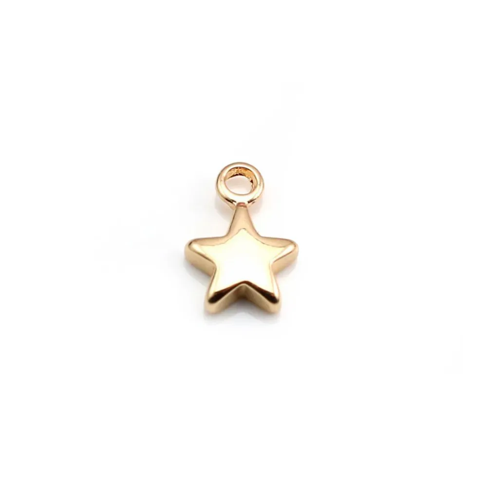 Breloque étoile par "flash" or sur laiton 7x10mm x 10pcs