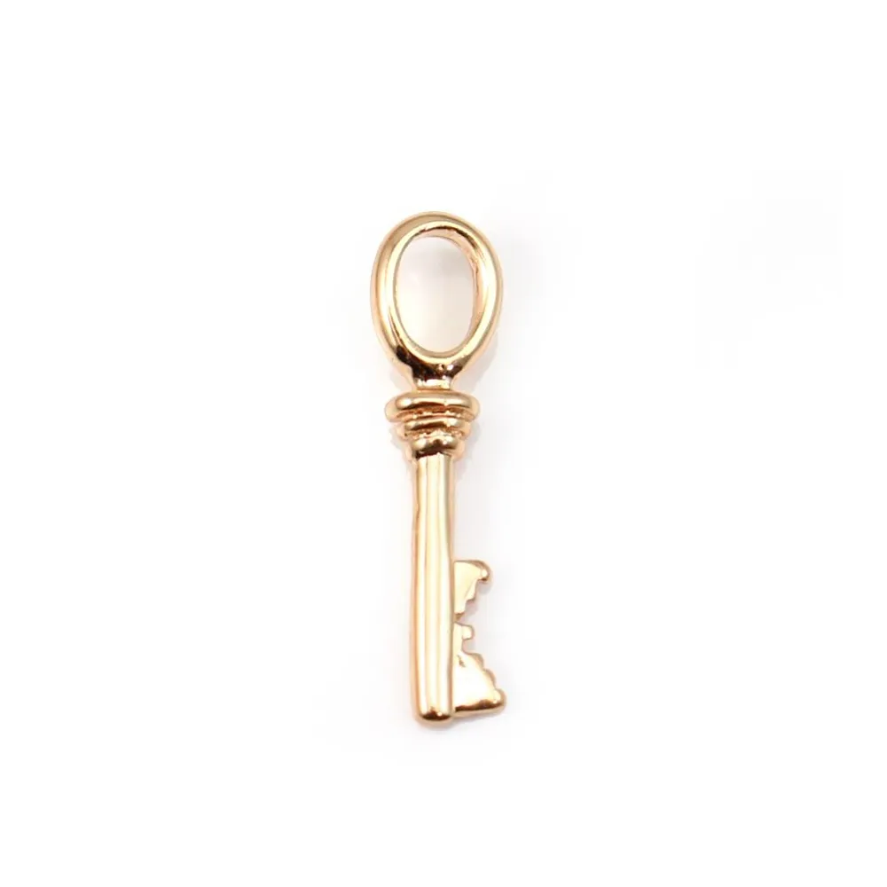 Clé  Plaquée par "flash" or sur laiton 5.7x22.7mm x1pc