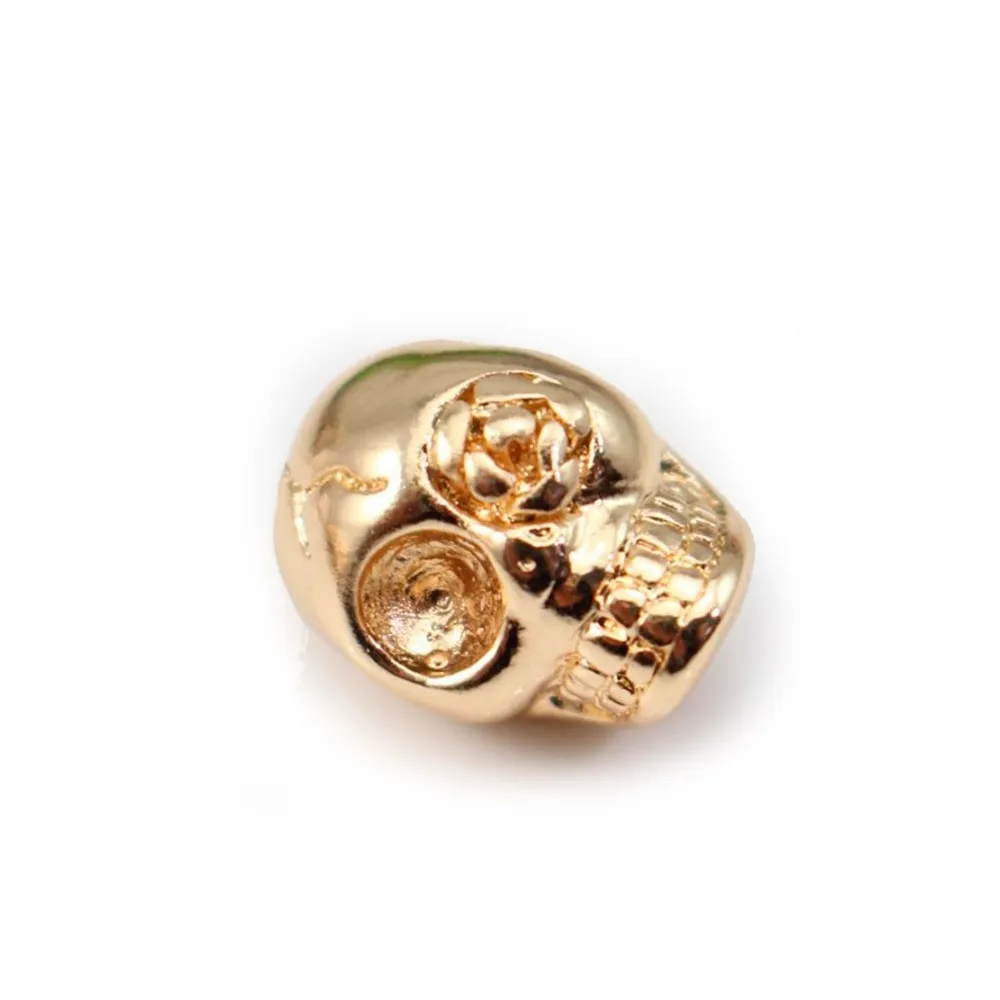 Tête de mort plaquée par "flash" or sur laiton 4.5x9mm x 2pcs
