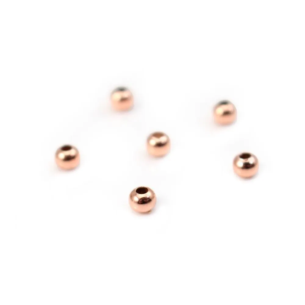 Boule dorée rose sur laiton 1.1x3mm x 50pcs