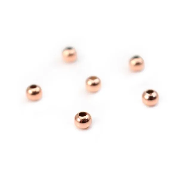 Boule dorée rose sur laiton 1.1x3mm x 50pcs