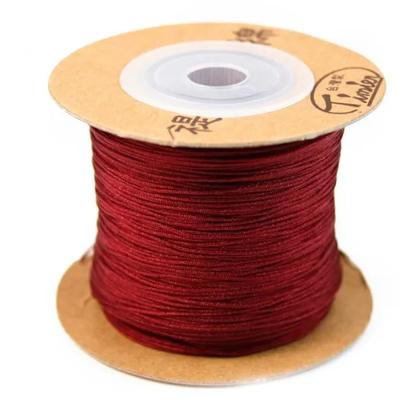 Fil polyester bordeaux 0.5 mm x 180 m