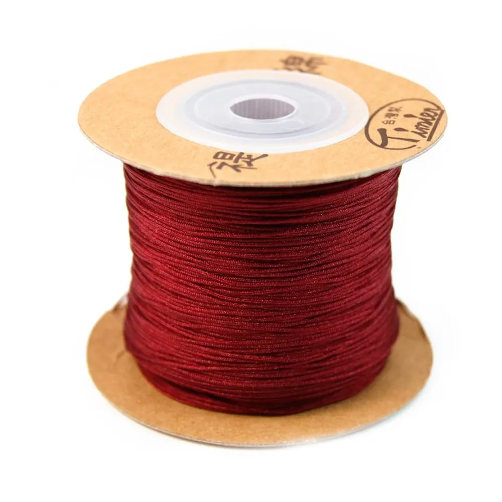 Fil polyester bordeaux 0.5 mm x 180 m