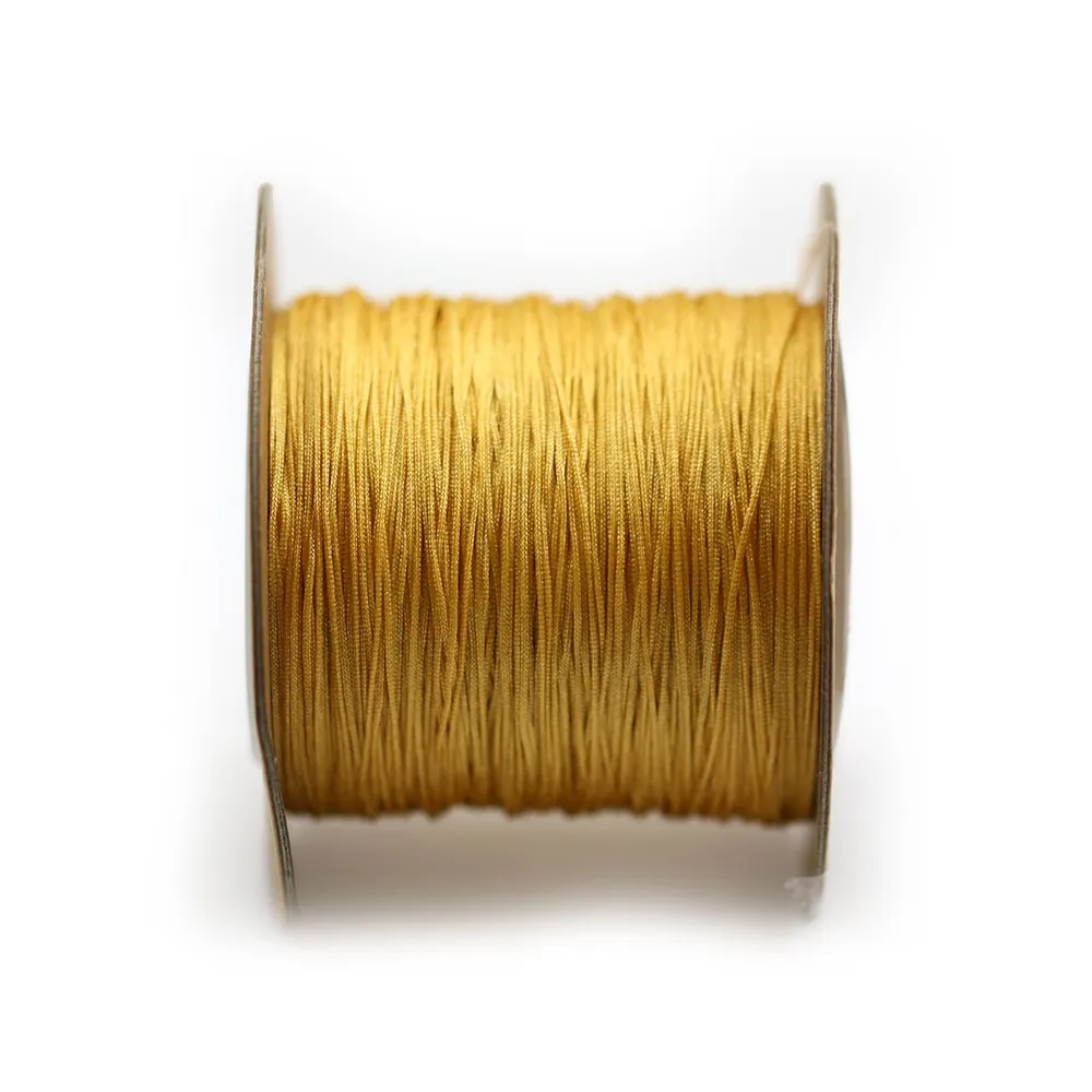 Fil polyester, de couleur orangé, 0.5mm x 180m