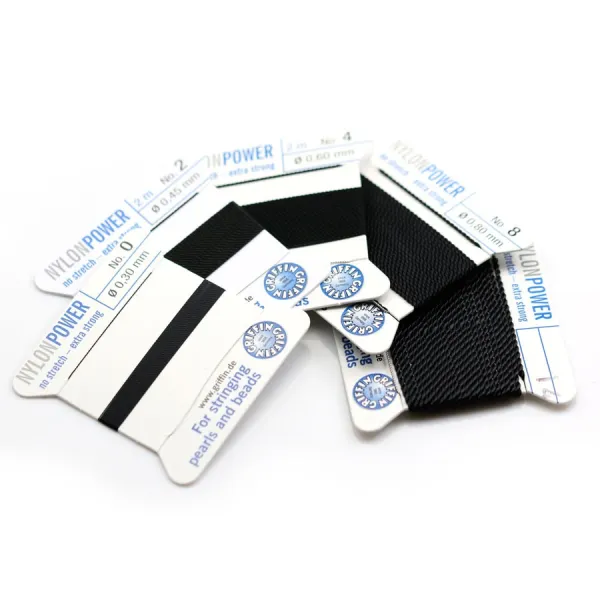 Nylon power wire with needle included, in black color x 2m