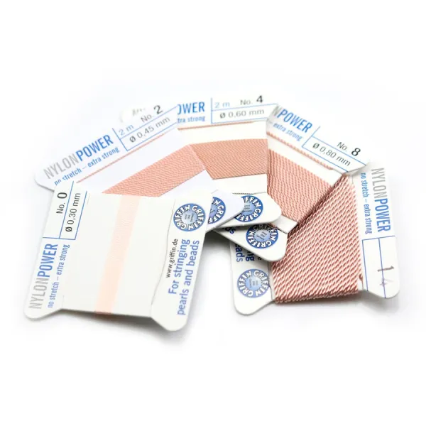 Fil power nylon avec aiguille inclus, de couleur rose pâle x 2m