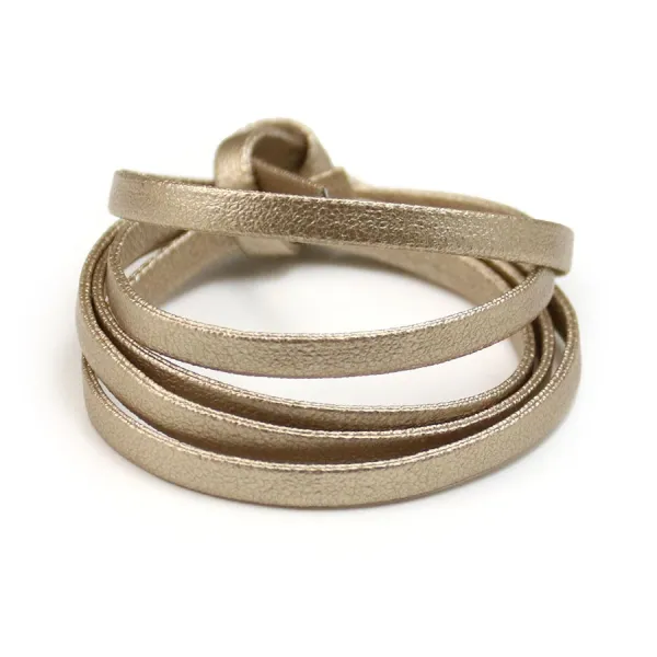 Synthetic leather, in flat shape, in champagne color, 5mm x 90cm