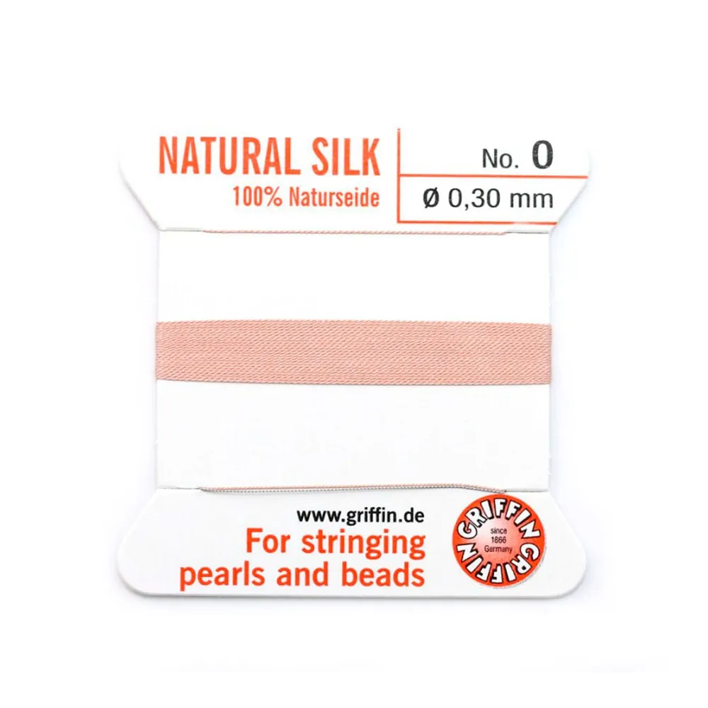 Fil de soie 0.3mm attaché à une aiguille rose pâle x 2m