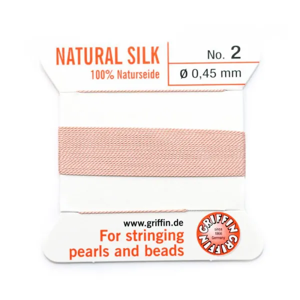 Fil de soie 0.45mm attaché à une aiguille rose pâle x 2m