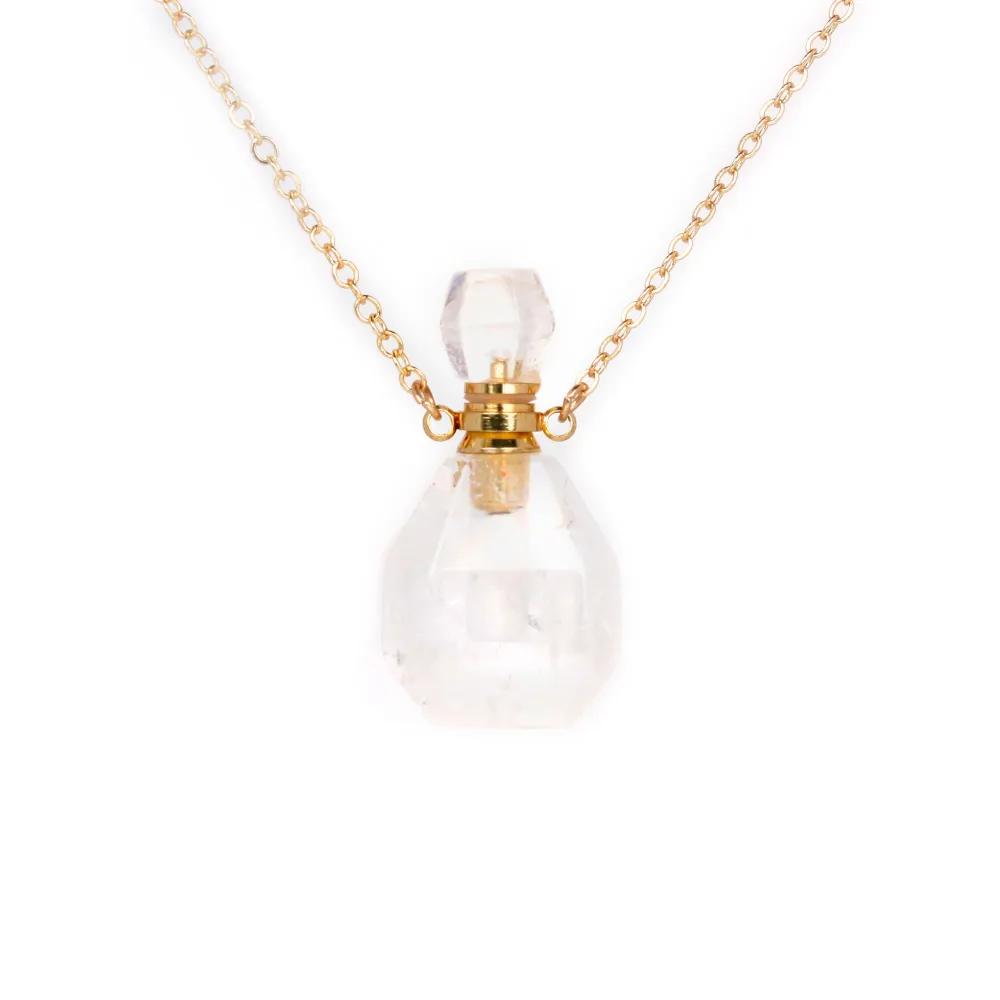 Collier en  plaquée par "flash" or sur laiton avec pendentif flacon de parfum  en Cristal de roche