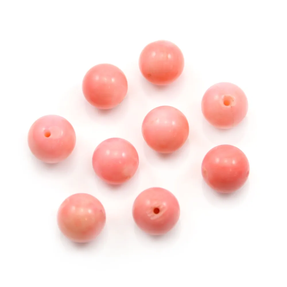 Bambou de mer orange pastel, semi-percé d'un côté, ronde 8mm x 1pc