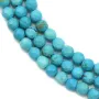Turquoise reconstitué de forme ronde facetté, mesurant 4mm x 40cm
