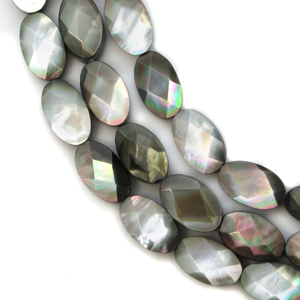 Nacre grise en ovale facetté sur fil 6x10mm x 40cm