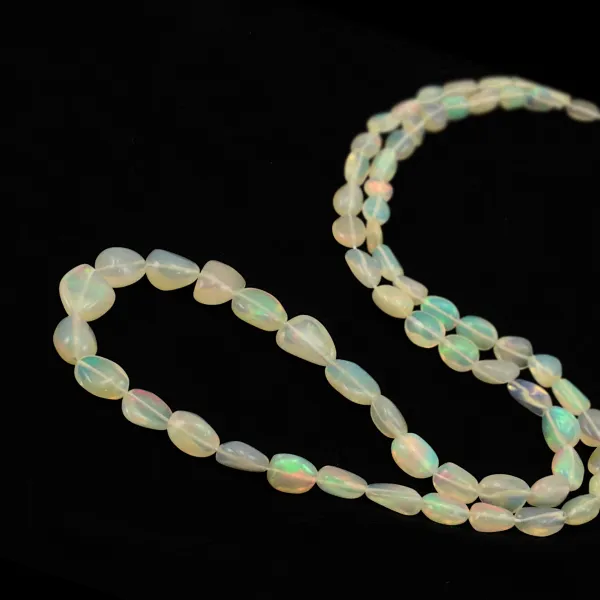 Äthiopischer Opal oval barock 5x7 - 8x12mm x 50cm