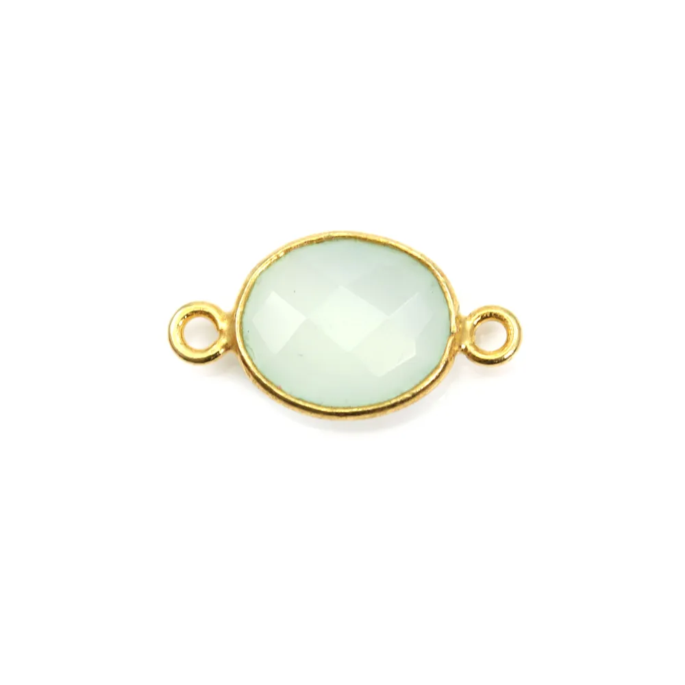 Calcédoine ovale facettée sertie sur argent doré 2 anneaux 9x11mm x 1pc