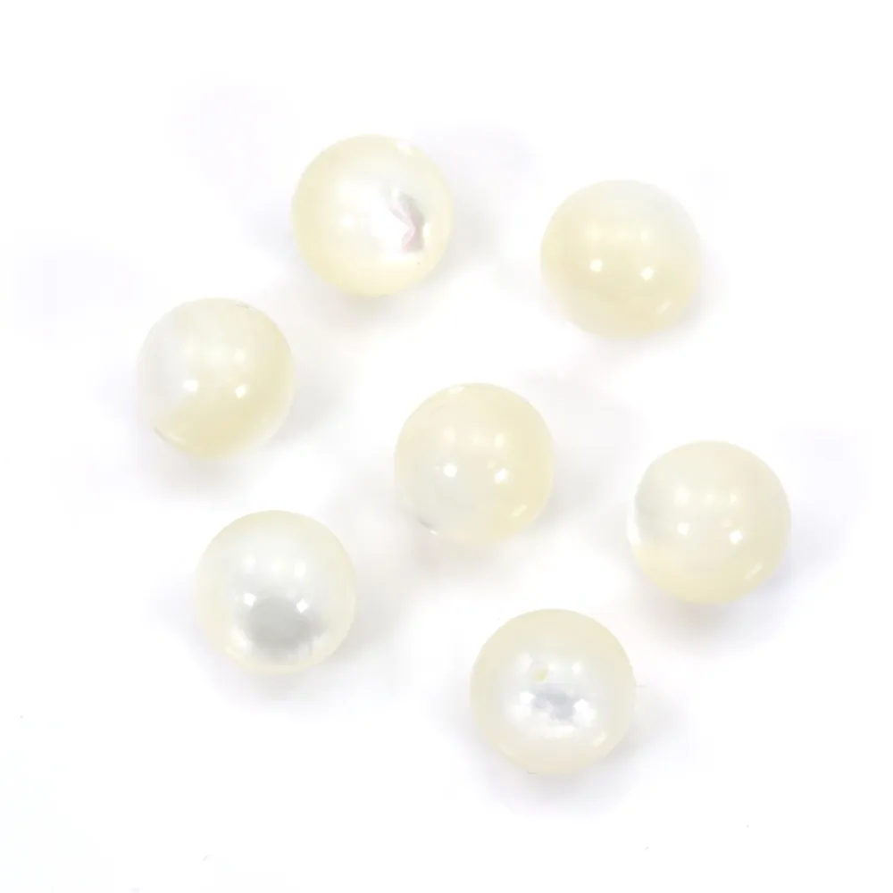 Nacre semi-percé d'un coté rond 6mm x 4pcs