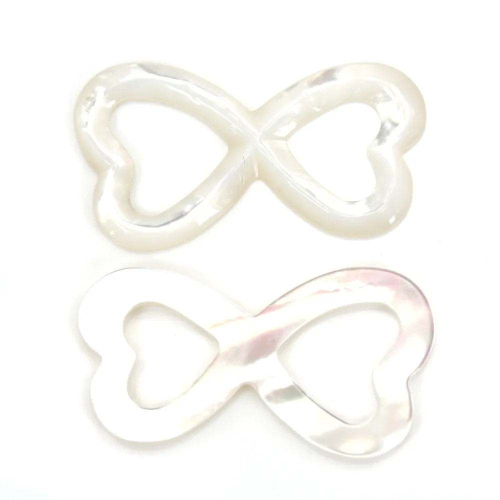 Nacre blanche double coeur ajouré 18x35mm x 1pc