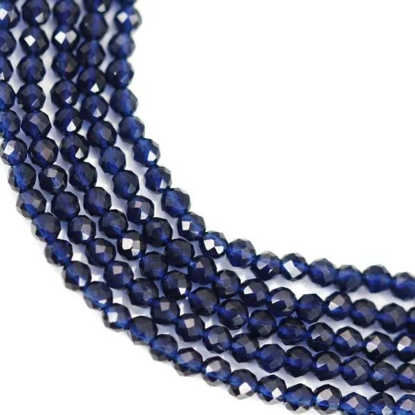 Saphir bleu synthétique, de forme ronde facetté, 2mm x 39cm