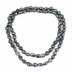 Long necklace in oval dark blue fresh water pearl, measuring 8 * 10mm x 1pc