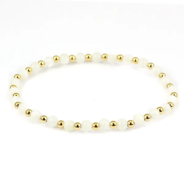 Bracelet nacre blanche 4mm, avec perles dorées x 1pc