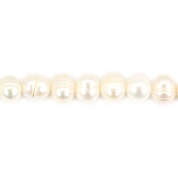 Freshwater cultured pearls, white, oval/irregular, 6.5-7mm x 35cm