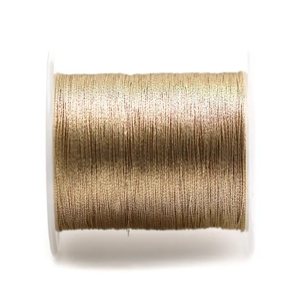 Fil polyester de couleur doré rosé, pailleté, 0.3mm x 150m