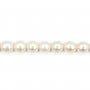 Perles d'eau douce blanc rosé ovales sur fil 6-7mm x 40cm
