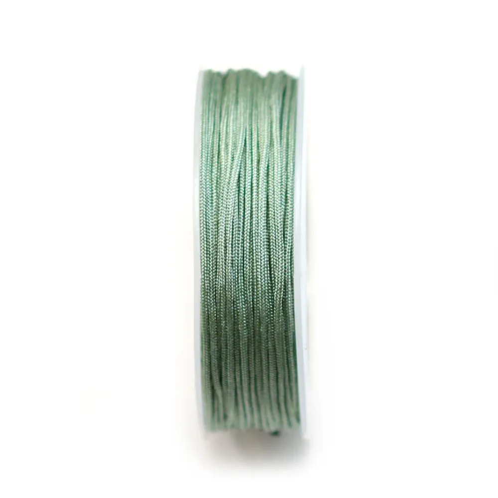 Fil polyester irisé vert amande 1.5mm x 15m