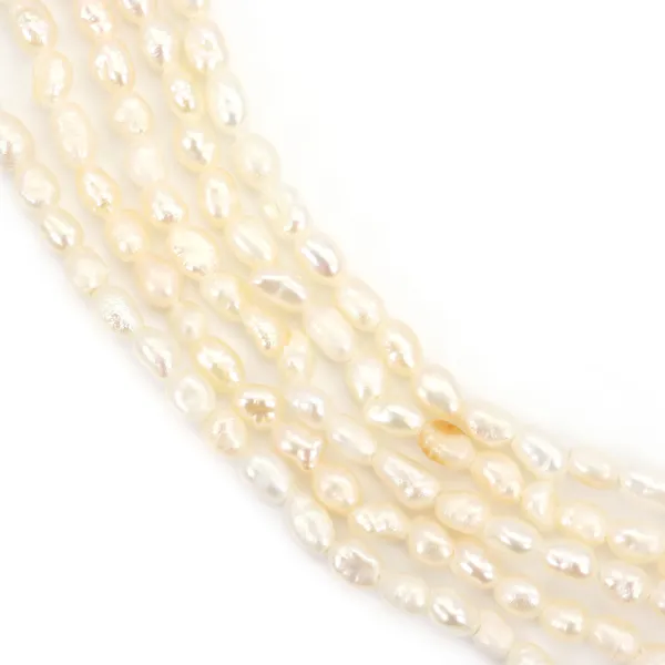 Pérola de água doce salmão oval 1.5-2mm x 39cm