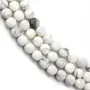 Howlite rond plat facetté 4mm x 39cm