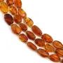 Ambre cognac baroque ovale 7x10mm x 38cm