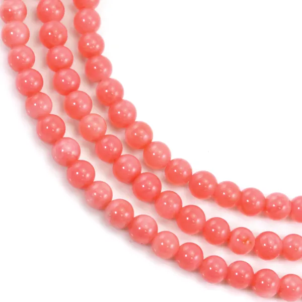 Bambou de mer teinté rose rond 4mm x 39cm