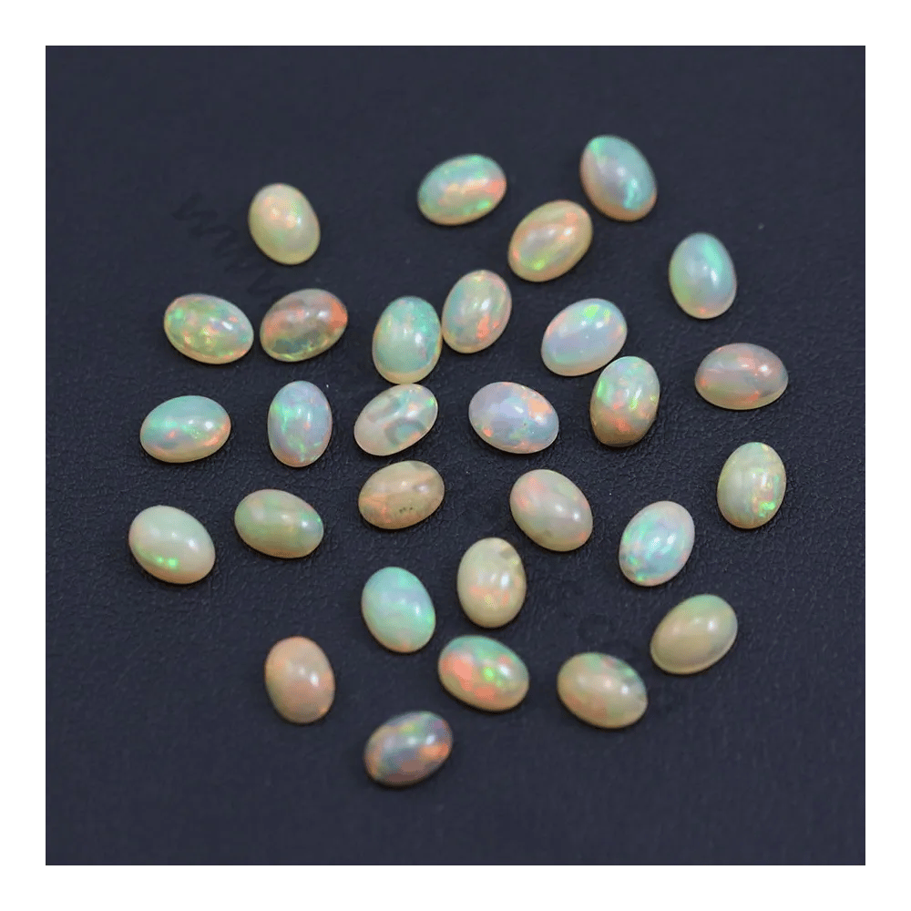 Ethiopian opal in cabochon, multicolored, in oval shape, 5 * 7mm x 1pc