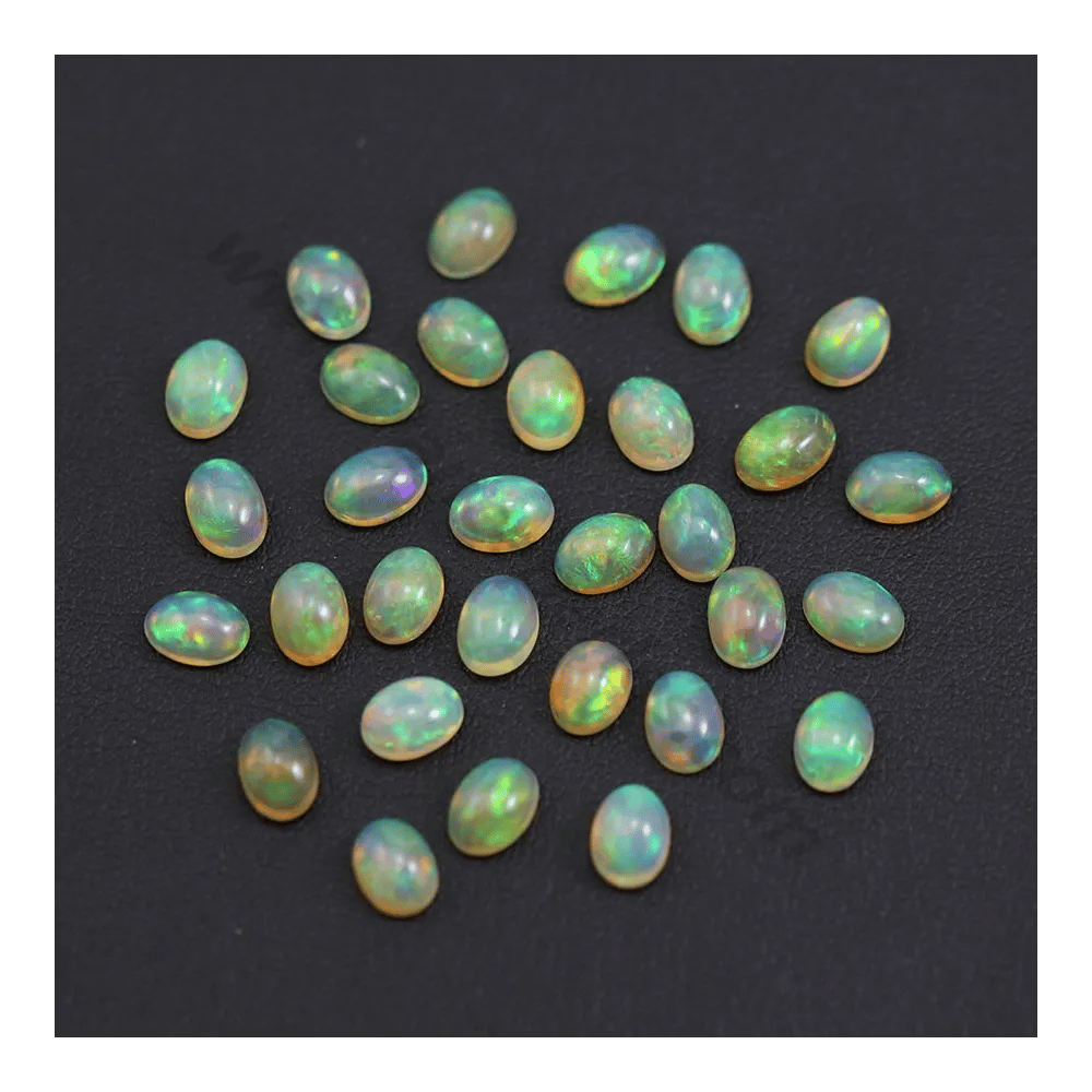 Ethiopian opal in cabochon, multicolored, in oval shape, 5 * 7mm x 1pc