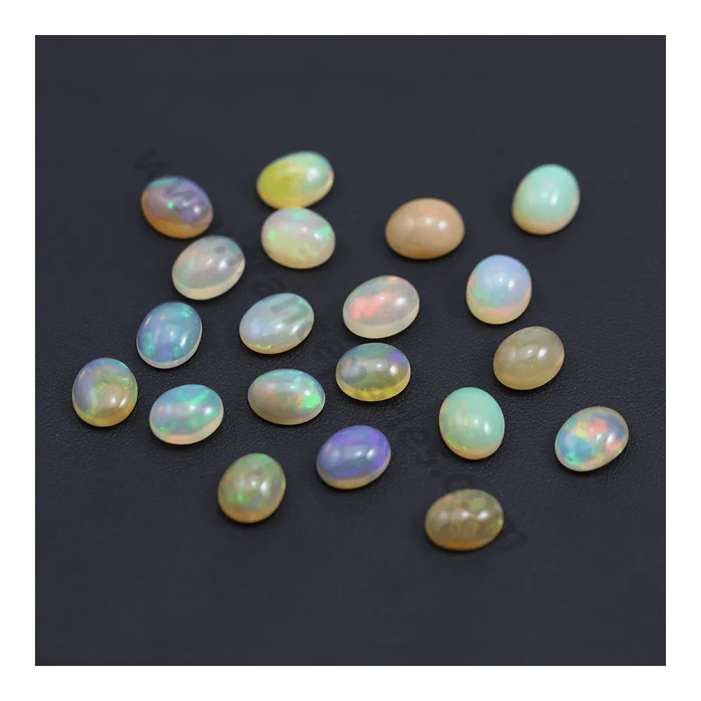 Ethiopian opal in cabochon, multicolored, in oval shape 9 * 11mm x 1pc