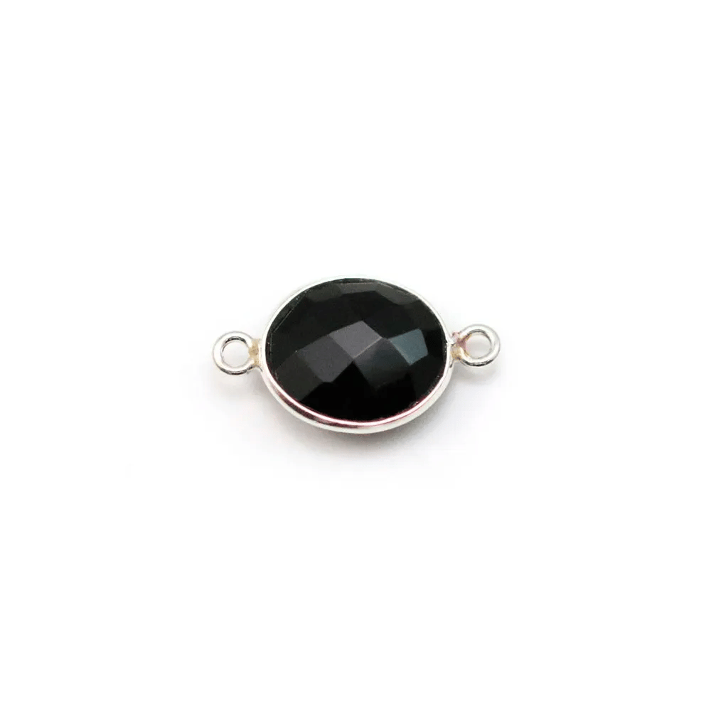 Agate in black color, in oval shape, 2 rings set in silver, 9x11mm x 1pc