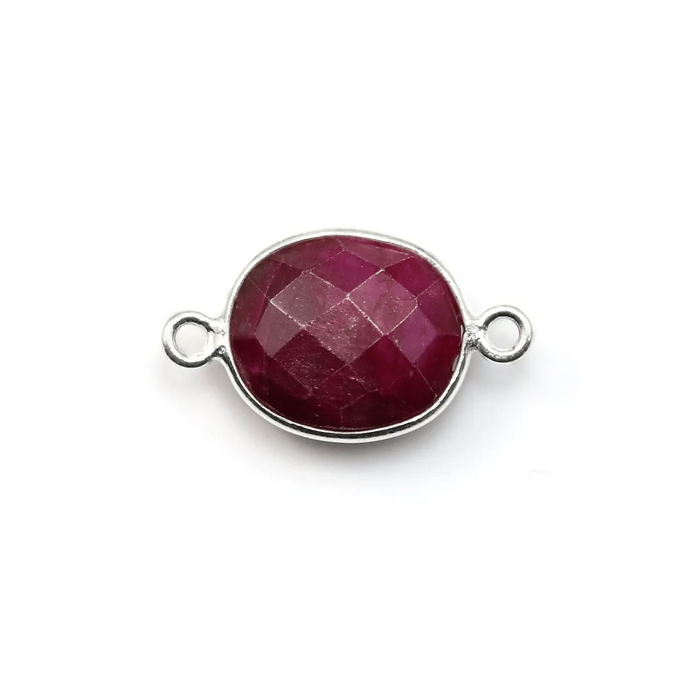 Pierre traitée couleur rubis sertie sur argent 925 ovale facettée et 2 anneaux 10x12mm x 1pc