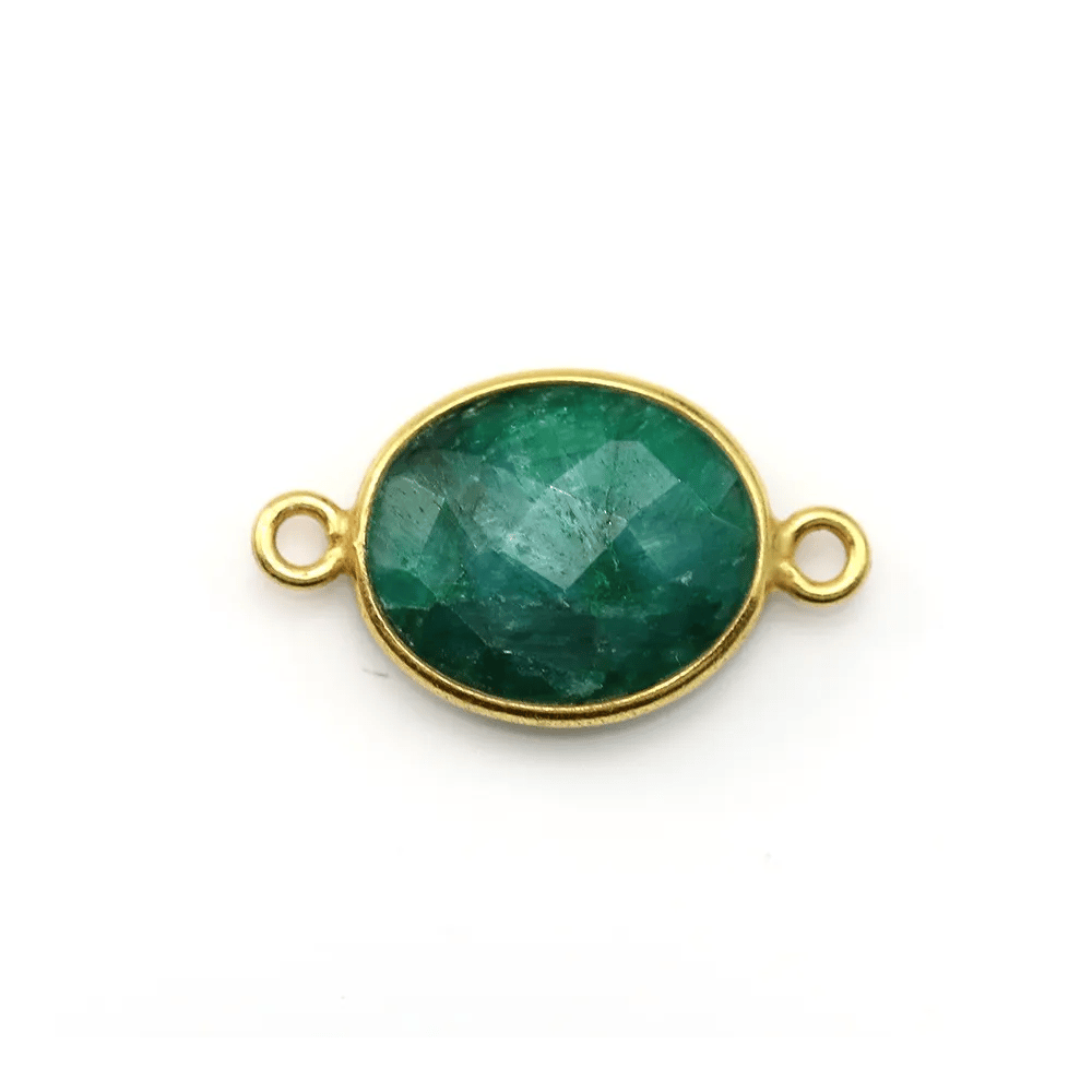 Pierre traitée de couleur émeraude sertie sur argent doré ovale facettée 2 anneaux 11x13mm x 1pc