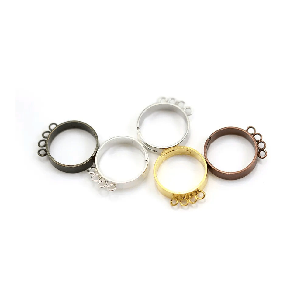 Bague réglable, de différentes couleurs, doté de 4 anneaux x 1pc