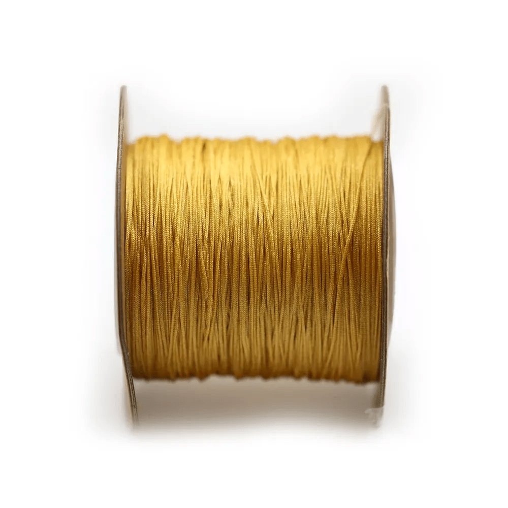 Fil polyester, de couleur orangé, 0.5mm x 180m